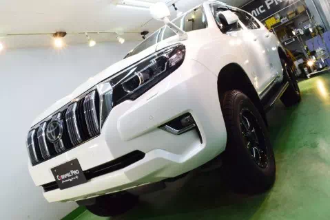 釧路市よりご来店したランドクルーザープラドの塗装飛沫除去とコーティング再施工の施工事例