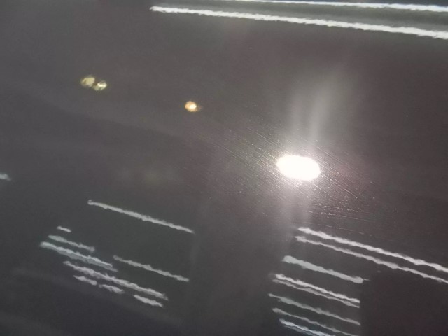 ヤリスクロスの塗装面をLEVEL2研磨で下地処理している様子